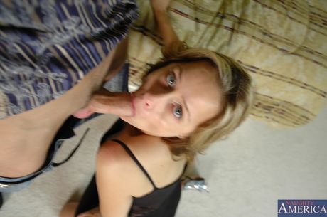 Tattooed cougar Payton Leigh has sex with a younger man on a bed