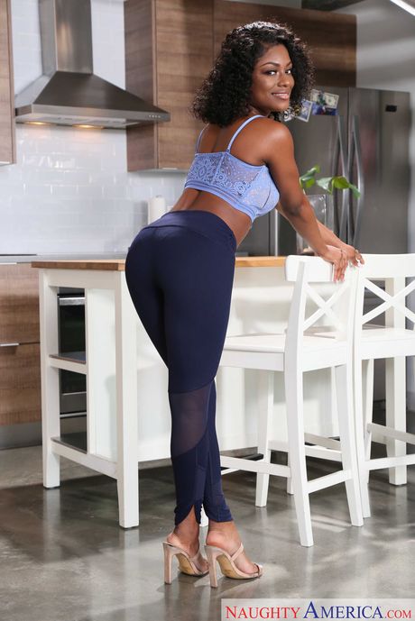 Black haired girlfriend Evi Rei strips and shows her big tits and ass in a solo