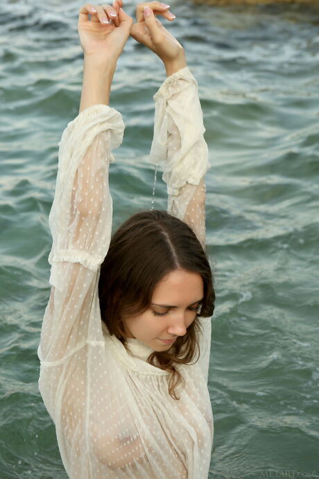 Danniela gets naked on the beach and shows off her sexy body