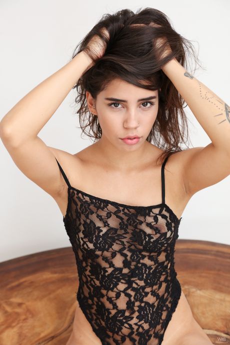 Sexy babe Clarisse strips off her lingerie before showing her pussy in the nude