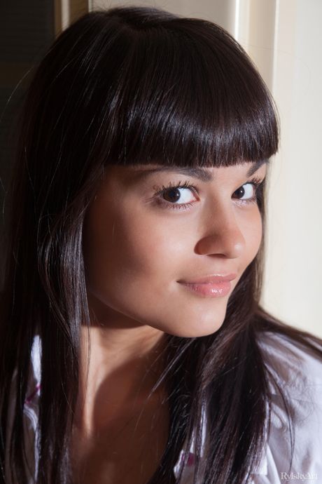 Asian teen Shereen shows off her hairy pussy in the nude