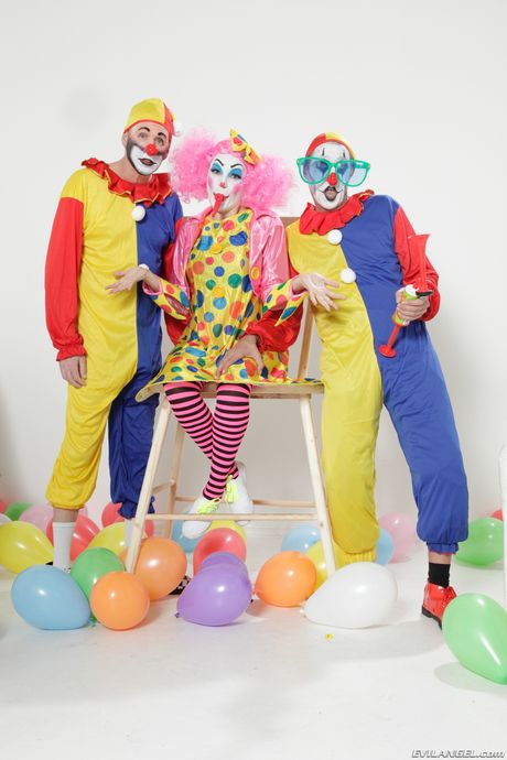 Busty asian babe Dana Vespoli gets her big tits fondled by perverted clowns