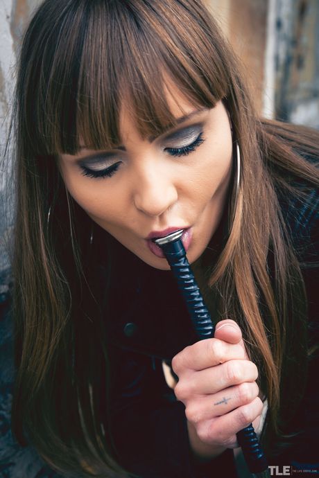 Natalie Russ is a nasty brunette who loves to flaunt her big breasts and freshly