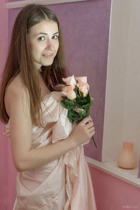 Delicate teen Hrizantema removes her lingerie to pose nude