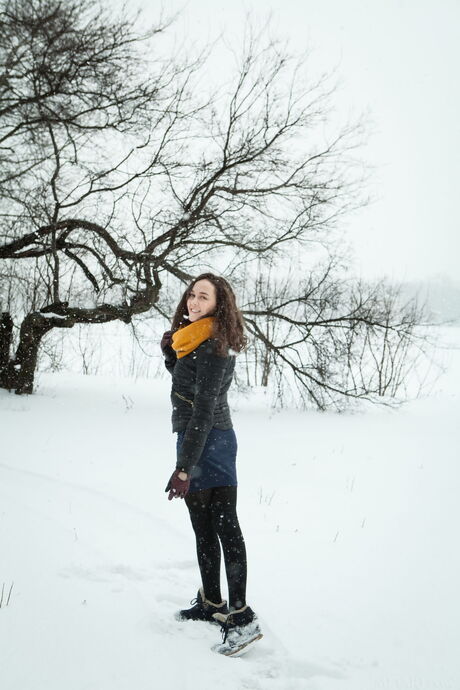 Desirable teen Ulia removes a black dress to pose nude in high heels