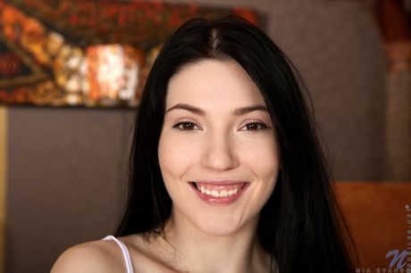 Nubiles: Lovely teen Mia Evans strips off her bikini before masturbating with a vibrator