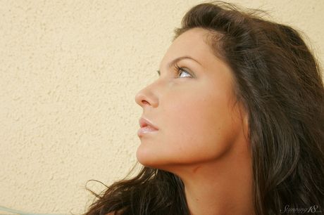 Nice teen Isabella takes it all off on a stool in a confident fashion