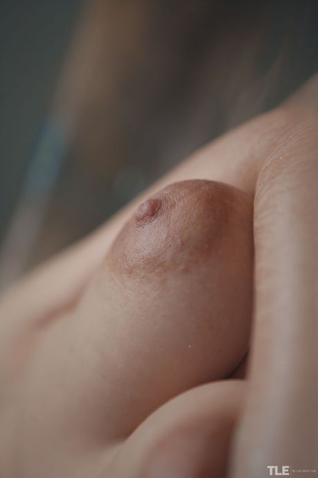 Emily J takes a shower and washes her body with a spoon