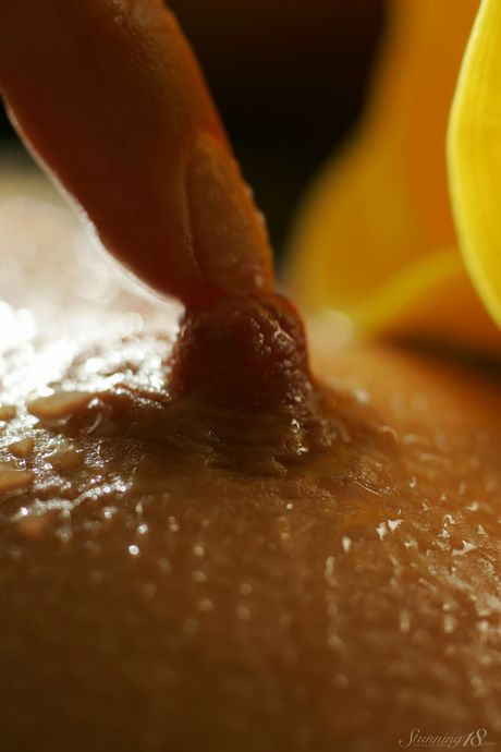 Charming teen Edison X bares her body while in a bathtub