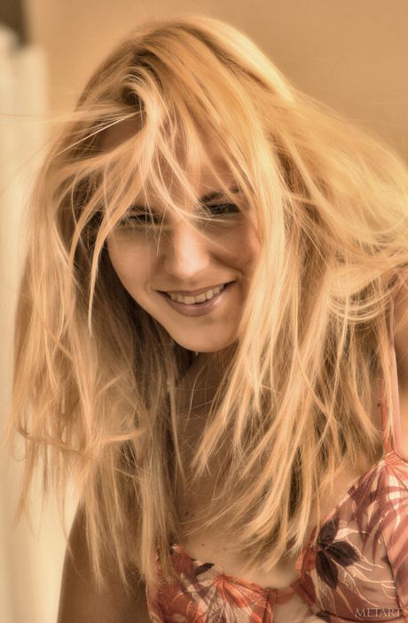 Chris is a beautiful woman with a slim figure and a slender waist