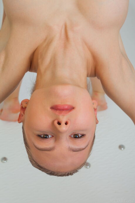 Thin teen Nalina reveals her big tits and poses naked