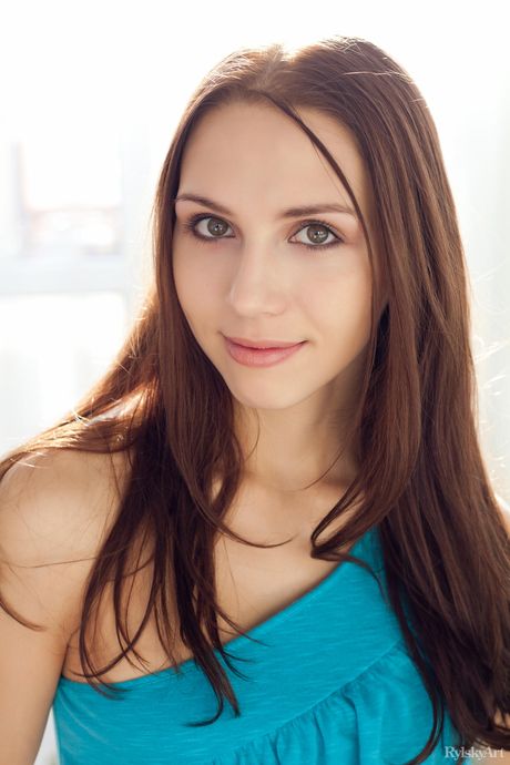 Nice teen Gemma gets totally naked in boots on a snowy road in the mountains