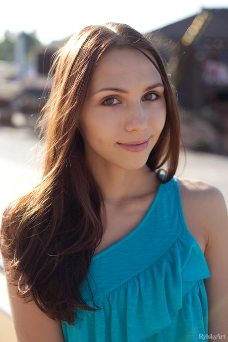 Nice teen Gemma gets totally naked in boots on a snowy road in the mountains