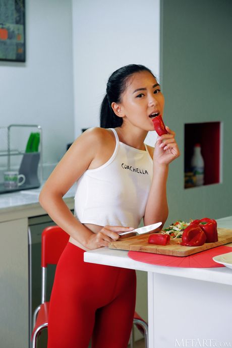 Kimiko gets naked in the kitchen and shows off her sexy body