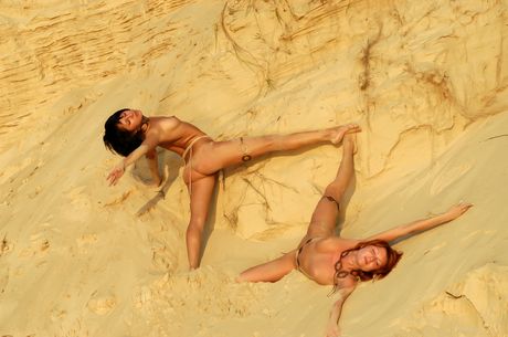 Winsome teen Maeve X bares her body on a sandy beach