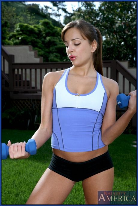 Sporty babe Nika Noir strips and shows her tight butt and pussy