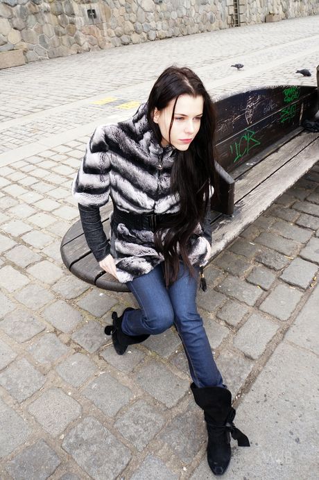 Glamorous teen Valeria poses in her sexy lingerie and strips on the floor