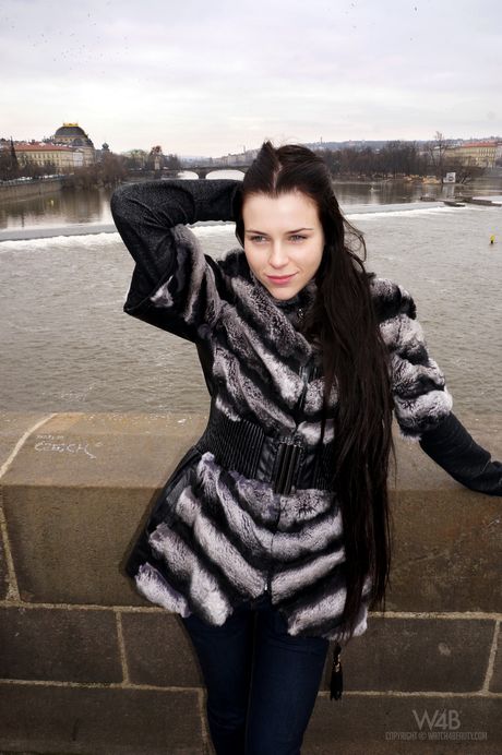 Glamorous teen Valeria poses in her sexy lingerie and strips on the floor