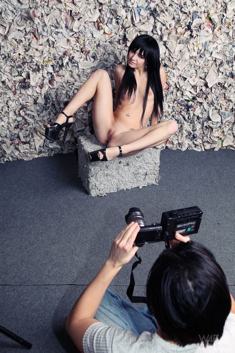 Delicate teen Svetlana shows her tattoos and bald pussy in the nude