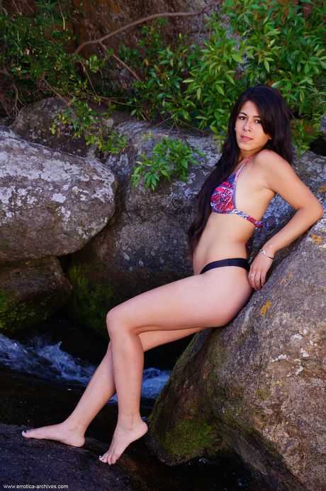 Daisy B takes off her bikini and poses to accentuate her puffy nipples