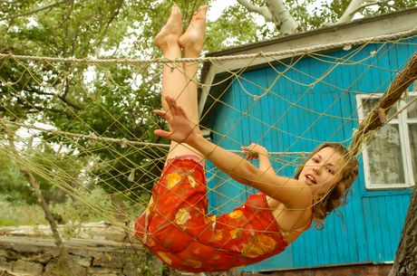 Sweet 18-year-old Drucilla N goes nude on a patio