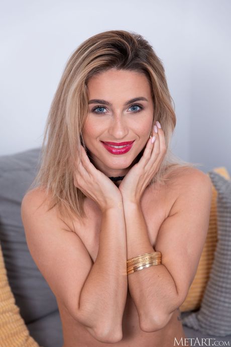 Young blonde Cara Mell gets nude with self-assuredness