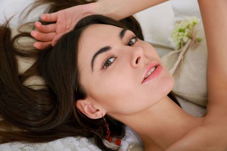 Delicate teen Stella Moon strips off her red lingerie & poses naked in the bedroom