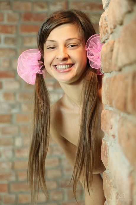 Teen model Maria bares her body in stockings and heels during solo action