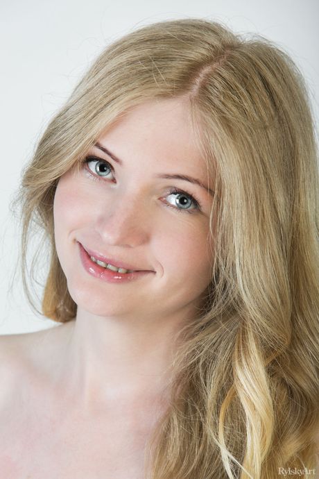 Innocent teen girl with long hair Launs poses naked without hesitation