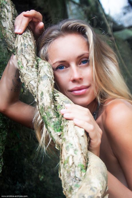 Young blonde Gretel models totally naked in shallow water