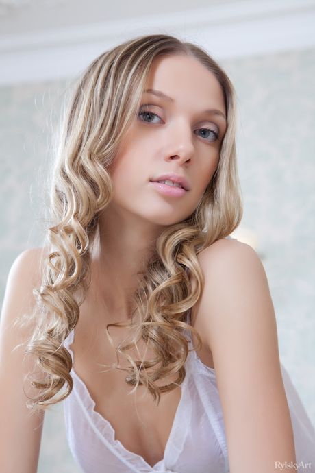 Delicate teen Augusta Crystal gets naked in stockings and heels