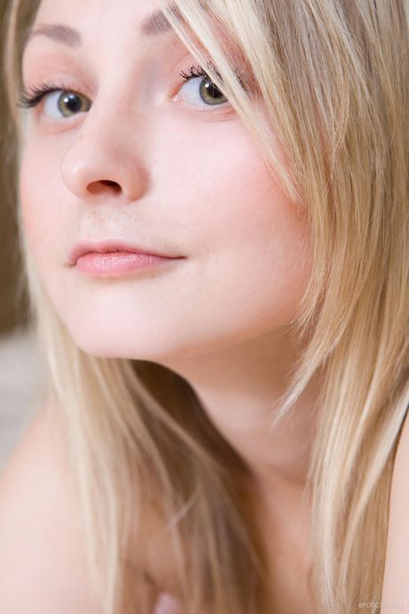 Tempting teen Adele C strips naked and teases with her hot ass and pussy