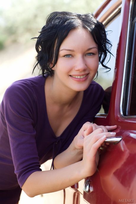 Perfect teen Loreen A strips naked in the back seat of a car & spreads her pussy