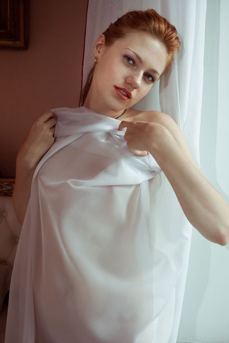 Petite teen Shirley Tate removes her lingerie & exposes herself in a bedroom