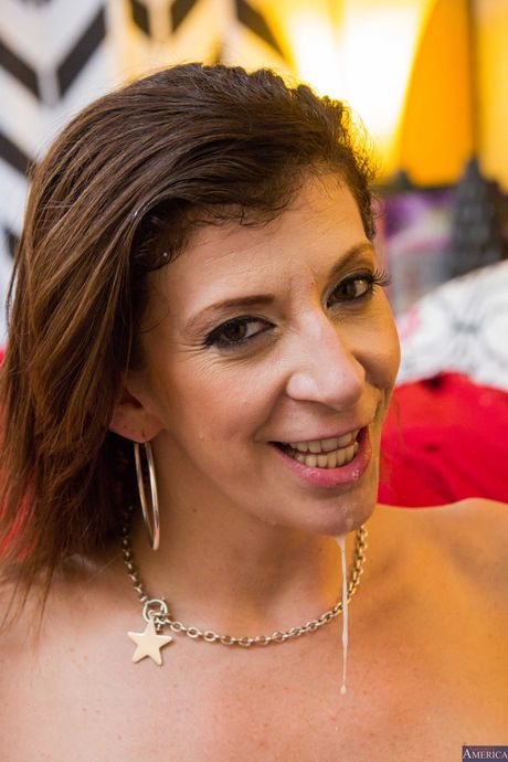 Curvy mature lady Sara Jay gives a blowjob and gets banged