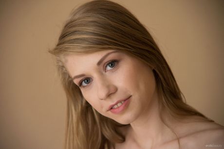 Barely legal girl Eva Gold bares herself in a confident fashion