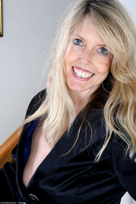 All Over 30: Amateur woman Ginger B removes a leather jacket before showing her pussy