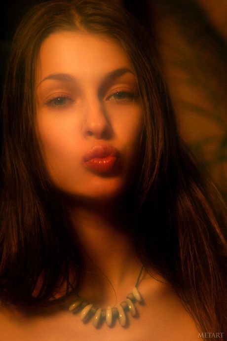 Ukrainian belle Vika AC removes her glasses and lingerie to pose nude