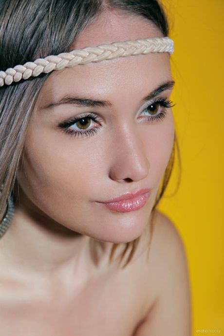 Delicate teen Emilia A poses nude and reveals her tiny tits and hot body