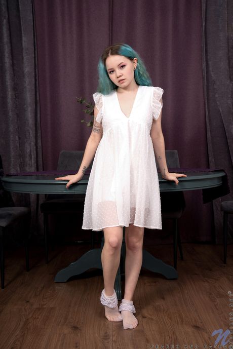 Angelic teen Rebecca Nikson strips off on a chair fearlessly