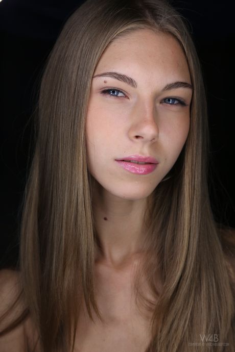 Hot teen Abby shows her great body while reading a book