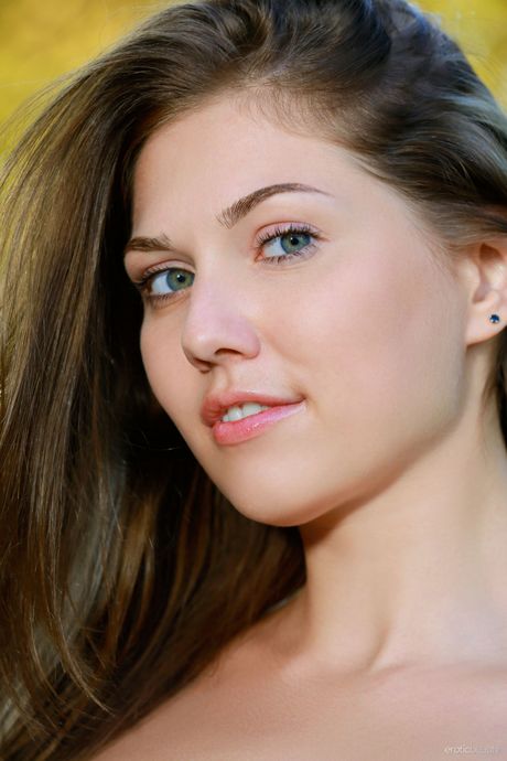 Bellina is a goddess of the woods, posing naked and showing off her sexy body