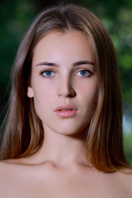 Gorgeous teen Hailey removes a dress to model in the nude