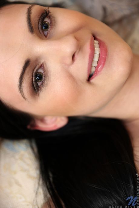 Hot babe Alice Nice toys her pussy after getting naked in high heels