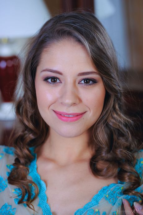 Brunette teen Cassandra strips off while in a bathtub