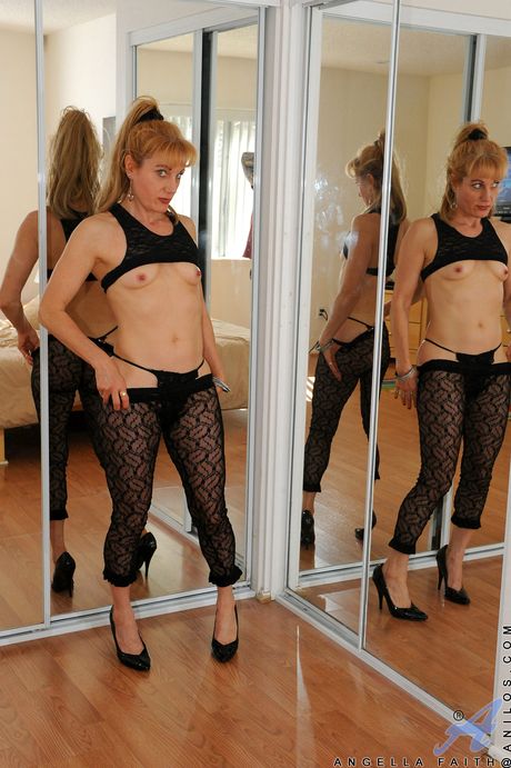 Blonde mature Angella Faith toys her shaved pussy in high heels