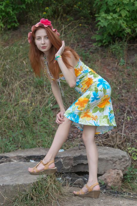 Skinny redhead Olivia I gets naked in the marshes and poses her sexy body