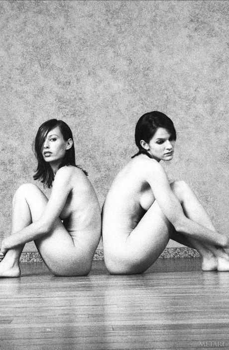 Lean teen with tiny tits and bald pussy poses naked in the studio