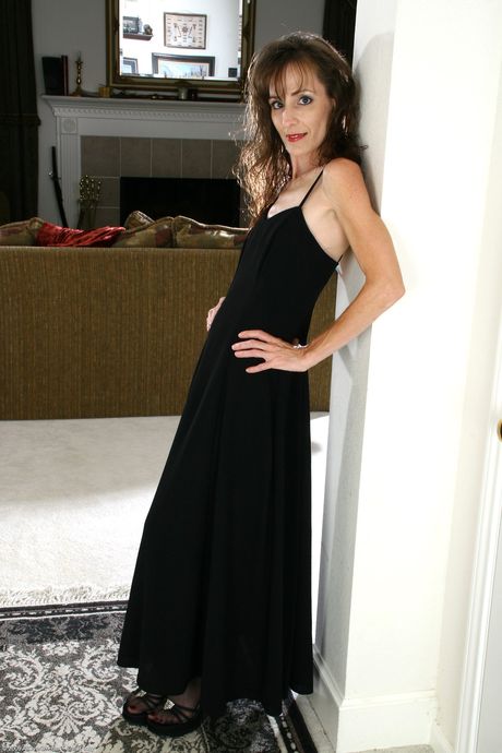 Mature blonde Sydney S shows off her big ass & her hairy pussy