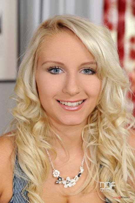 Porn World: Blonde mommy Natalia unveils her big tits and exhibits nudity on a dining table